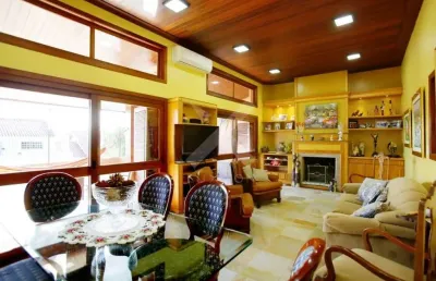 Casa com 4 quartos à venda na rua alcebíades antônio dos santos, 157, nonoai, porto alegre por r$ 1.650.000