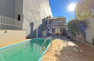 Casa com 3 quartos à venda na rua barão do guaíba, 719, menino deus, porto alegre por r$ 2.100.000