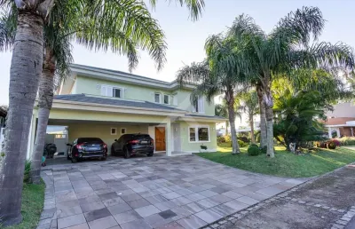 Casa em condomínio fechado com 4 quartos à venda na avenida juca batista, 8000, chapéu do sol, porto alegre por r$ 3.900.000