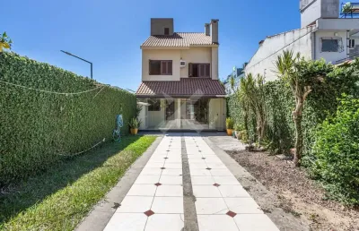 Casa em condomínio fechado com 4 quartos à venda na rua chico pedro, 191, cristal, porto alegre por r$ 990.000