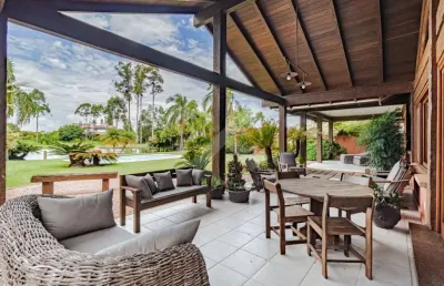 Casa em condomínio fechado com 4 quartos à venda na avenida juca batista, 8000, belém novo, porto alegre por r$ 5.000.000