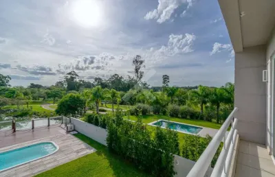 Casa em condomínio fechado com 4 quartos para alugar na avenida juca batista, 9000, belém novo, porto alegre por r$ 12.000