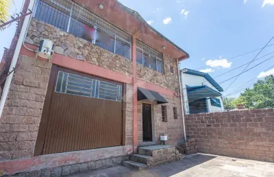 Prédio para alugar na rua camoati, 210, santa maria goretti, porto alegre por r$ 4.500