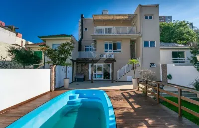 Casa em condomínio fechado com 3 quartos à venda na rua luzitana, 1098, higienópolis, porto alegre por r$ 2.250.000