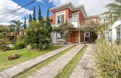 Casa em condomínio fechado com 3 quartos à venda na avenida juca batista, 8000, belém novo, porto alegre por r$ 1.750.000