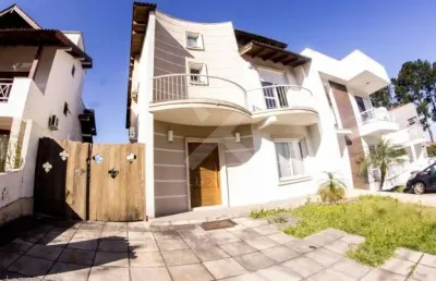Casa em condomínio fechado com 3 quartos à venda na avenida edgar pires de castro, 540, hípica, porto alegre por r$ 1.100.000