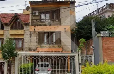 Casa com 3 quartos à venda na rua comendador creidy, 51, três figueiras, porto alegre por r$ 1.600.000