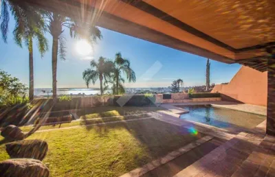 Casa em condomínio fechado com 4 quartos à venda na rua gilberto laste, 180, santa tereza, porto alegre por r$ 8.500.000