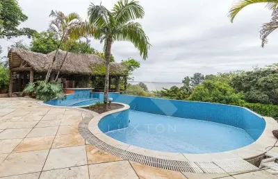 Casa com 5 quartos à venda na rua bororó, 301, vila assunção, porto alegre por r$ 4.800.000