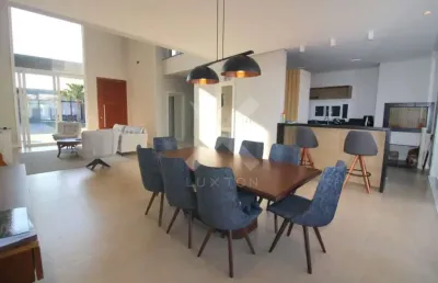 Casa em condomínio fechado com 4 quartos à venda na rua rio divisa, 32, centro, xangri-lá por r$ 2.980.000