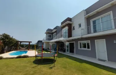 Casa em condomínio fechado com 5 quartos à venda na avenida alphaville, 2745, alphaville, gravataí por r$ 3.700.000