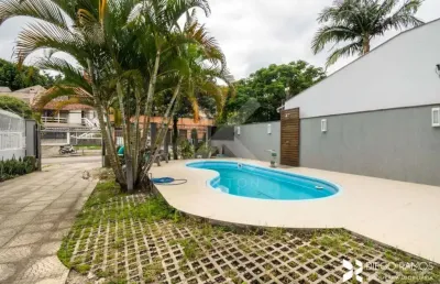 Casa com 4 quartos à venda na avenida josé gertum, 369, chácara das pedras, porto alegre por r$ 2.000.000