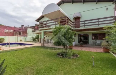 Casa com 5 quartos à venda na rua cariri, 142, vila assunção, porto alegre por r$ 2.850.000