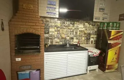 Casa sobreposta térrea à venda no boqueirão, santos – 2 dormitórios, quintal e churrasqueira