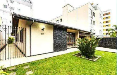 185m² privativos em terreno de 411m² com ampla área interna e externa!
