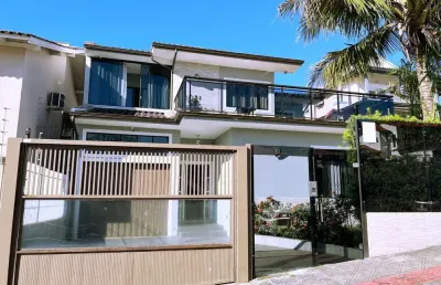 Casa em condomínio fechado com 3 quartos à venda na rua padre osmar muller, itaguaçu, florianópolis por r$ 2.260.000