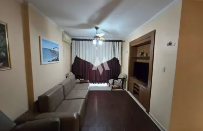 Frente mar na aparecida: 2 dorms, 2 vagas e a tranquilidade que você procura!