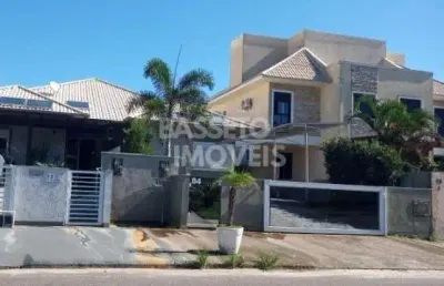Casa em condomínio fechado com 3 quartos à venda na rua do ipê da várzea, 84, cachoeira do bom jesus, florianópolis por r$ 1.400.000