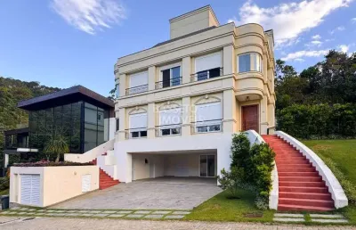 Casa em condomínio fechado com 4 quartos à venda na rodovia haroldo soares glavan, 115, cacupé, florianópolis por r$ 5.300.000