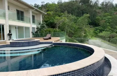 Casa em condomínio fechado com 7 quartos à venda na estrada haroldo soares glavan, 4450, cacupé, florianópolis por r$ 17.000.000