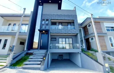 Casa com 3 quartos à venda na rua oristela foggiatto, costeira, são josé dos pinhais, 263 m2 por r$ 1.199.000