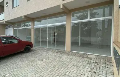 Prédio com 02 apartamentos e com sala comercial no térreo