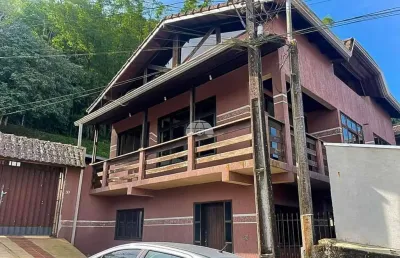 Casa com 4 quartos à venda na avenida leovegildo de freitas, s/n, centro, antonina, 225 m2 por r$ 565.000