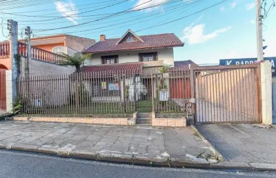 Casa com 4 quartos à venda na rua capitão zeppin, 137, uberaba, curitiba, 391 m2 por r$ 1.400.000
