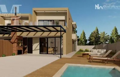 Sobrado alto padrão, com 3 quartos, sendo 2 no piso térreo, churrasqueira, terraço (com espera para piscina). há 450 metros da praia.
