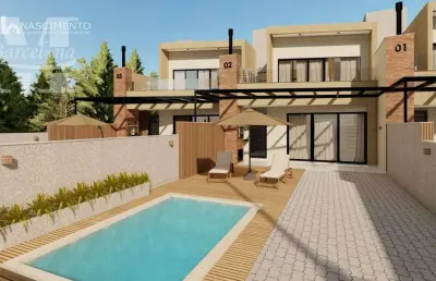 Sobrado alto padrão, com 3 quartos, sendo 2 no piso térreo, churrasqueira, terraço (com espera para piscina). há 450 metros da praia.