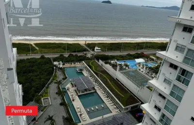 Apartamento pé na areia, em frente ao mar, piçarras. pronto, 3 suítes, churrasqueira e sacada.