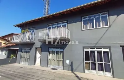 Prédio residencial + casa de alvenaria, iririú - joinville