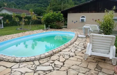 Casa com 4 quartos à venda na rua jose maria storache, 99, penha, antonina, 250 m2 por r$ 750.000