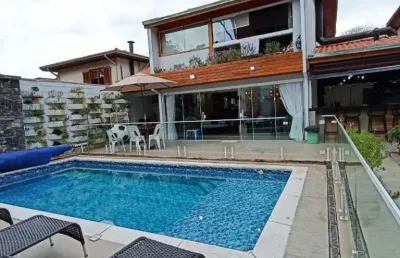 Casa 4 dormitótios sendo 3 suites a venda no condominio carmel , na granja viana cotia