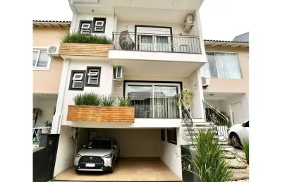 Casa em condomínio fechado com 4 quartos e 4 vagas de garagem à venda no bairro passo das pedras em porto alegre.