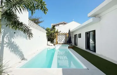 Casa com 4 quartos à venda na Rua Dr. José Mugiati Sobrinho, 313, Centro, Guaratuba