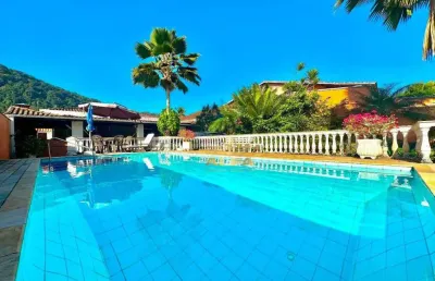 Casa com 4 quartos à venda na Avenida Humberto Pietro Peres, 65, Jardim Guaiuba, Guarujá