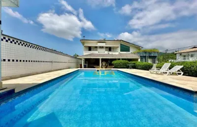 Casa com 5 suítes à venda, condomínio jardim acapulco, guarujá.