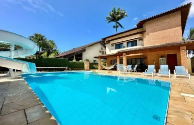 Casa com 4 suítes à venda no condomínio jardim acapulco, guarujá.