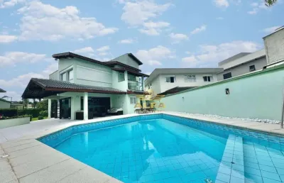Casa com 4 suítes à venda mais terreno, condomínio jardim acapulco, guarujá.