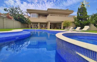 Casa em condomínio fechado com 5 quartos à venda na Rua Dois, 87, Jardim Acapulco, Guarujá
