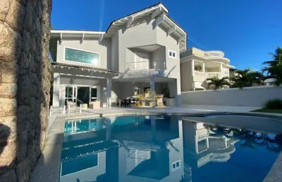 Casa em condomínio fechado com 4 quartos à venda na Avenida Albino dos Santos Gandares, 250, Jardim Acapulco, Guarujá