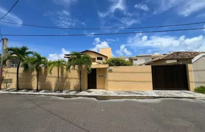 Vendo linda casa duplex 4/4 sendo 03 suites solta em condominio jardim do atlantico no bairro de buraquinho.