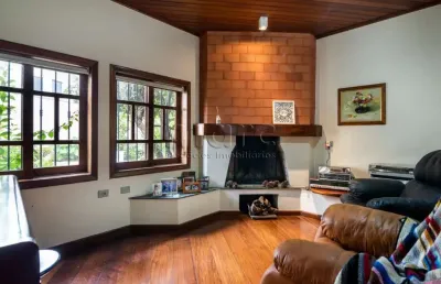 Casa com 4 quartos à venda na rua montezuma, 32, jardim das bandeiras, são paulo por r$ 3.900.000