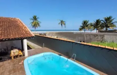 Casa com piscina frente-mar em mongaguá!! - cód: act3192
