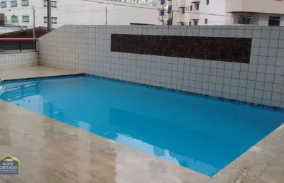 Apto apenas uma quadra da praia , sacada com churrasqueira, mobiliado r$500 mil
