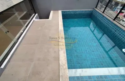 Casa sobreposta alta duplex com piscina, churrasqueira e vista mar