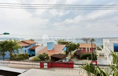 Apartamento com 03 dormitórios, com vista mar, localizado na avenida principal da praia do centro de bombinhas/sc