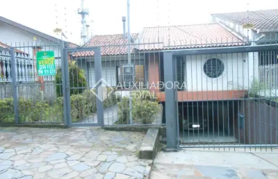 Casa em condomínio fechado com 4 quartos à venda na rua tomaz edison, 127, santo antônio, porto alegre, 308 m2 por r$ 850.000