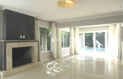Casa em condomínio fechado com 2 quartos à venda na avenida juca batista, 8000, hípica, porto alegre, 250 m2 por r$ 2.000.000